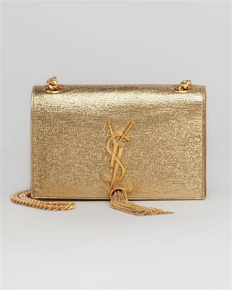 ysl clutch side bag|YSL clutch bag with tassel.